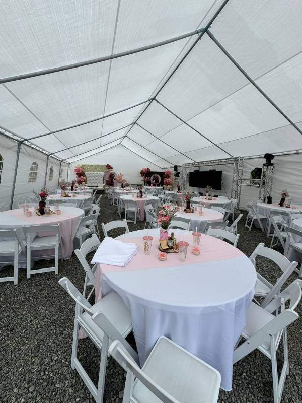 Thumbnail of a small stage with DJ equipment